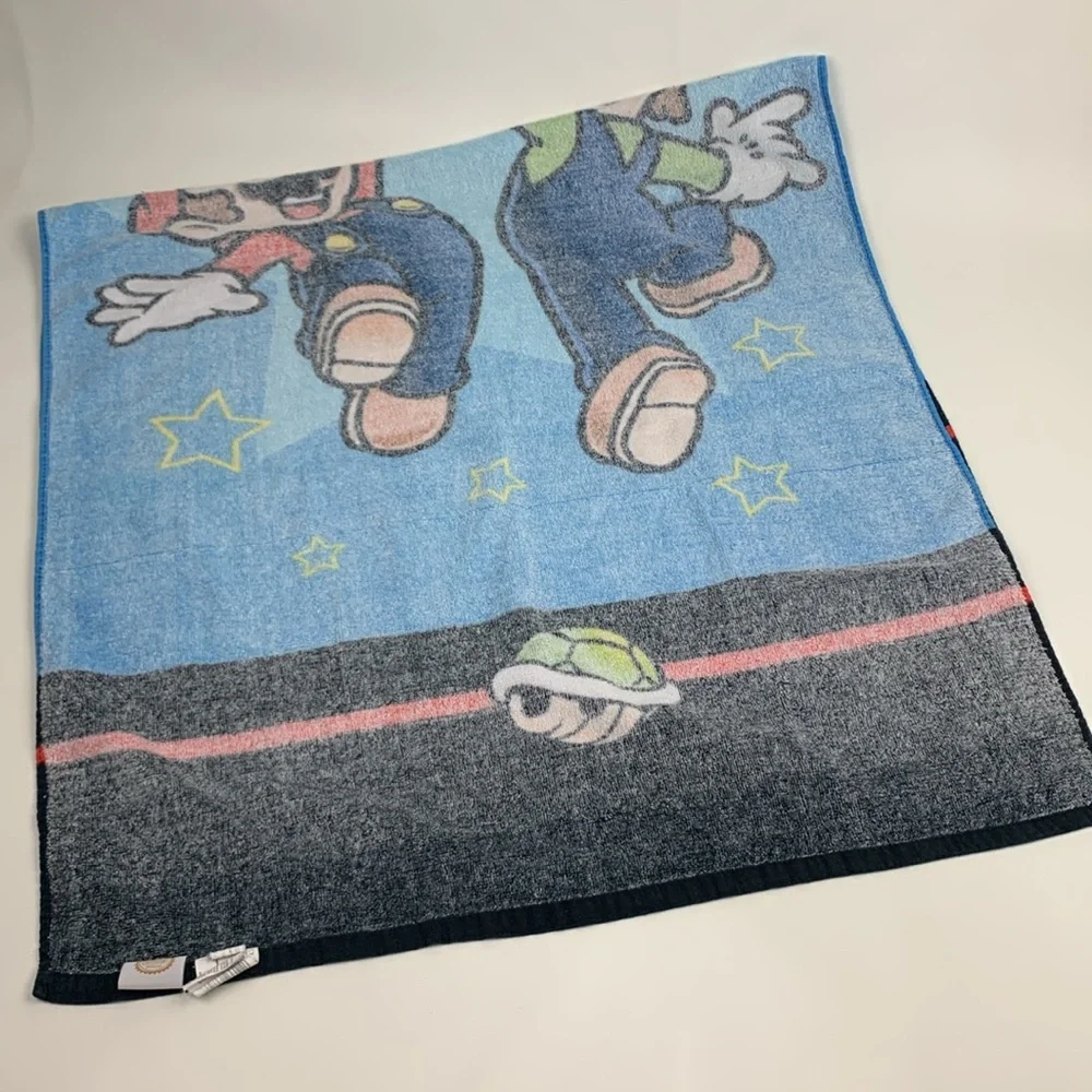 Nintendo Super Mario Bros colorful Blue Beach Towel Video game towel 27x52”